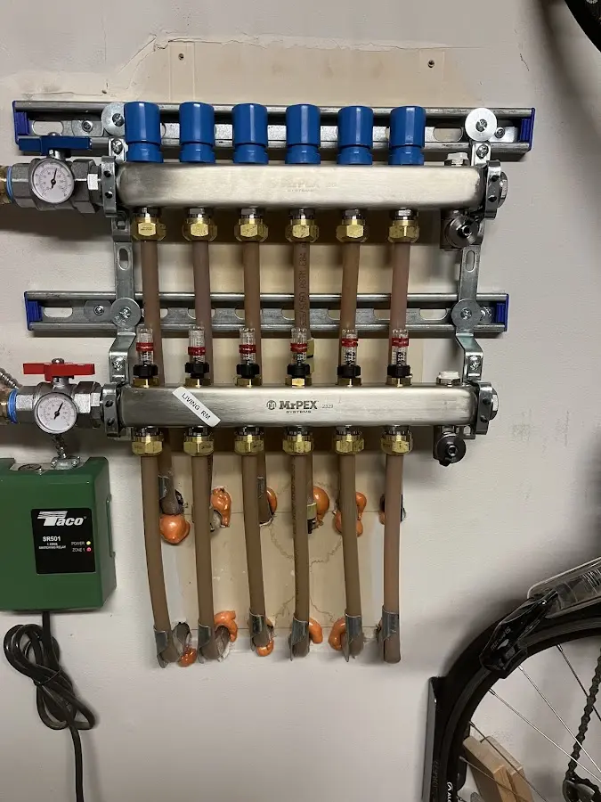 Plumber performing Gas Line Installation at a residential property in Moorhead